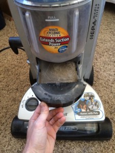 Keep your vacuum running like new by keeping the filter above the carpet brush clean